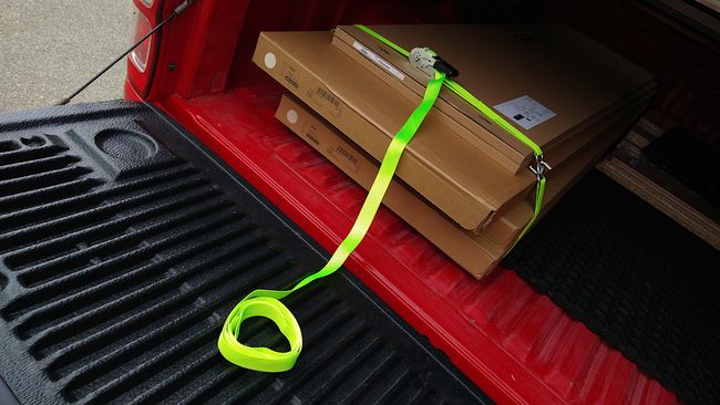 Daher das Ende vom Gurt aufrollen...