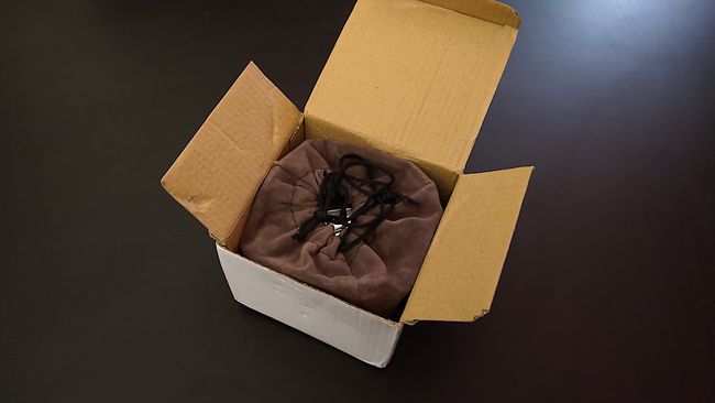 Im Karton in einem Beutel: Brenner und Abstellgestell